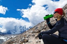 Woman Drinking In Mountains Xs 300x199